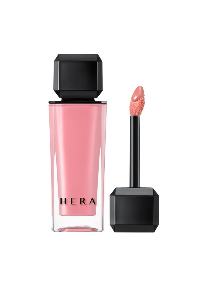Hera Sensual Nude Gloss 5g — model's lips wearing sheer nude shade with glossy finish
