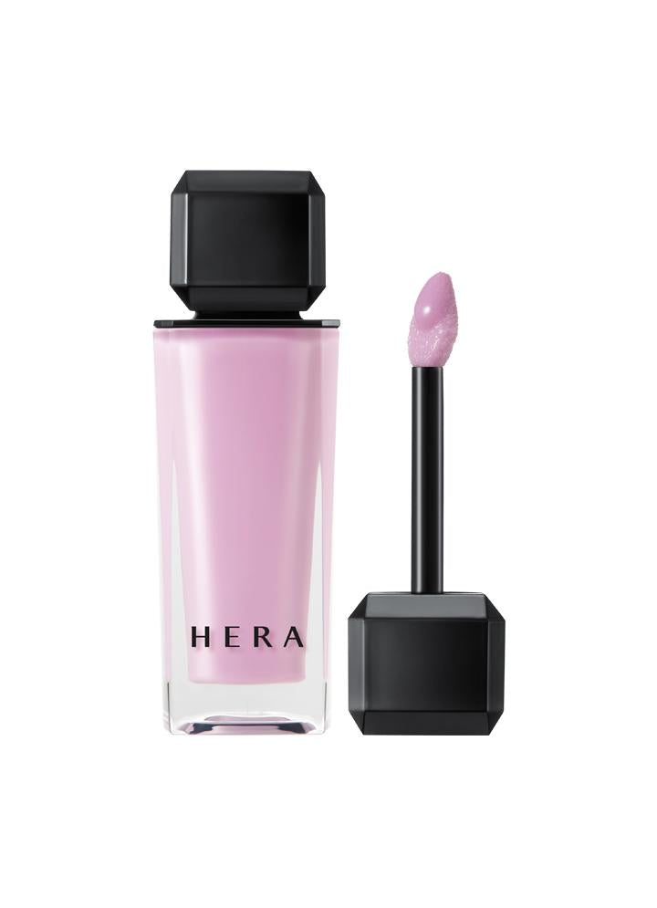 Hera Sensual Nude Gloss 5g — collection of shade tubes arranged in a row on white surface