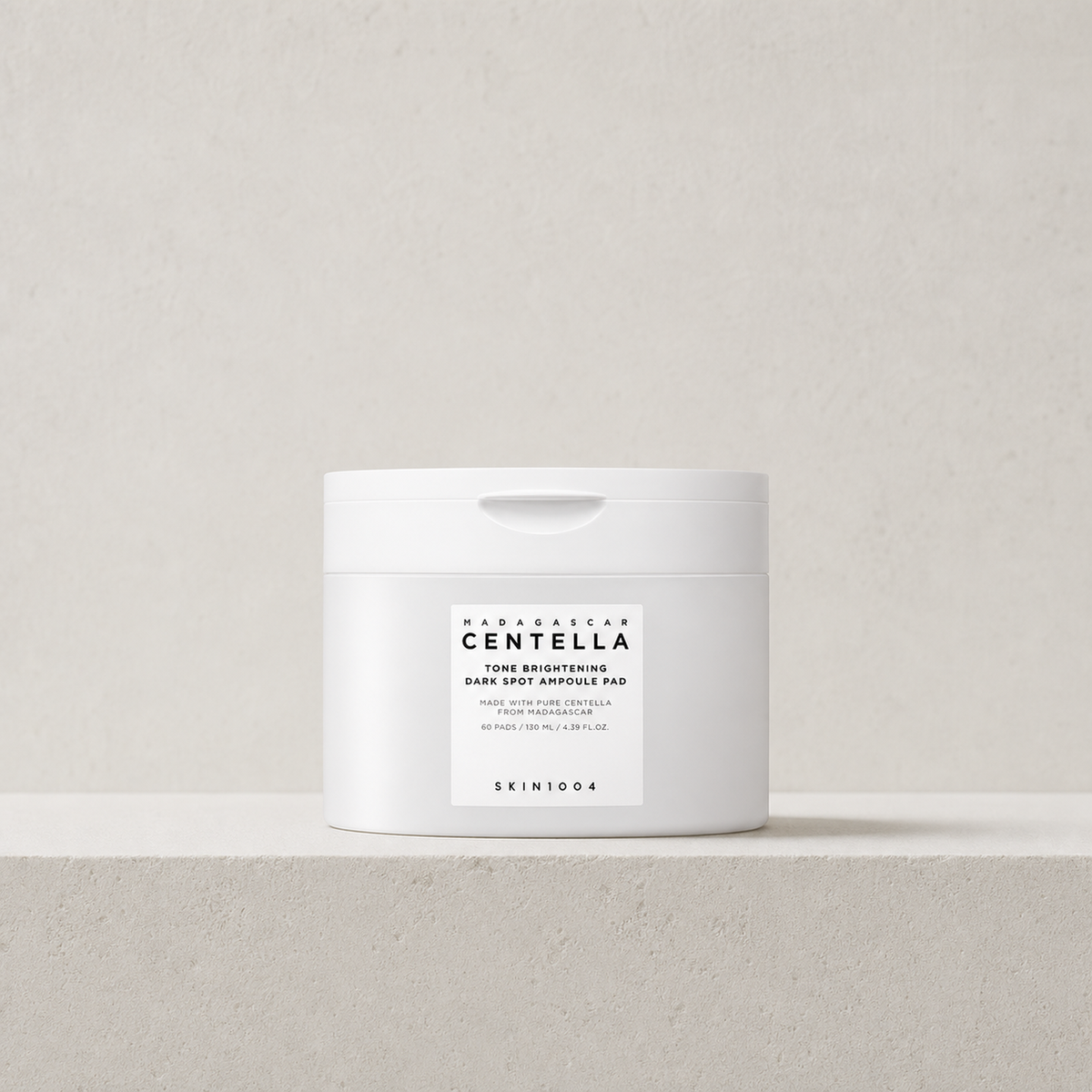 [SKIN1004] Madagascar Centella Tone Brightening Dark Spot Ampoule Pad 60pads - Bathroom spa shelf PDP image
