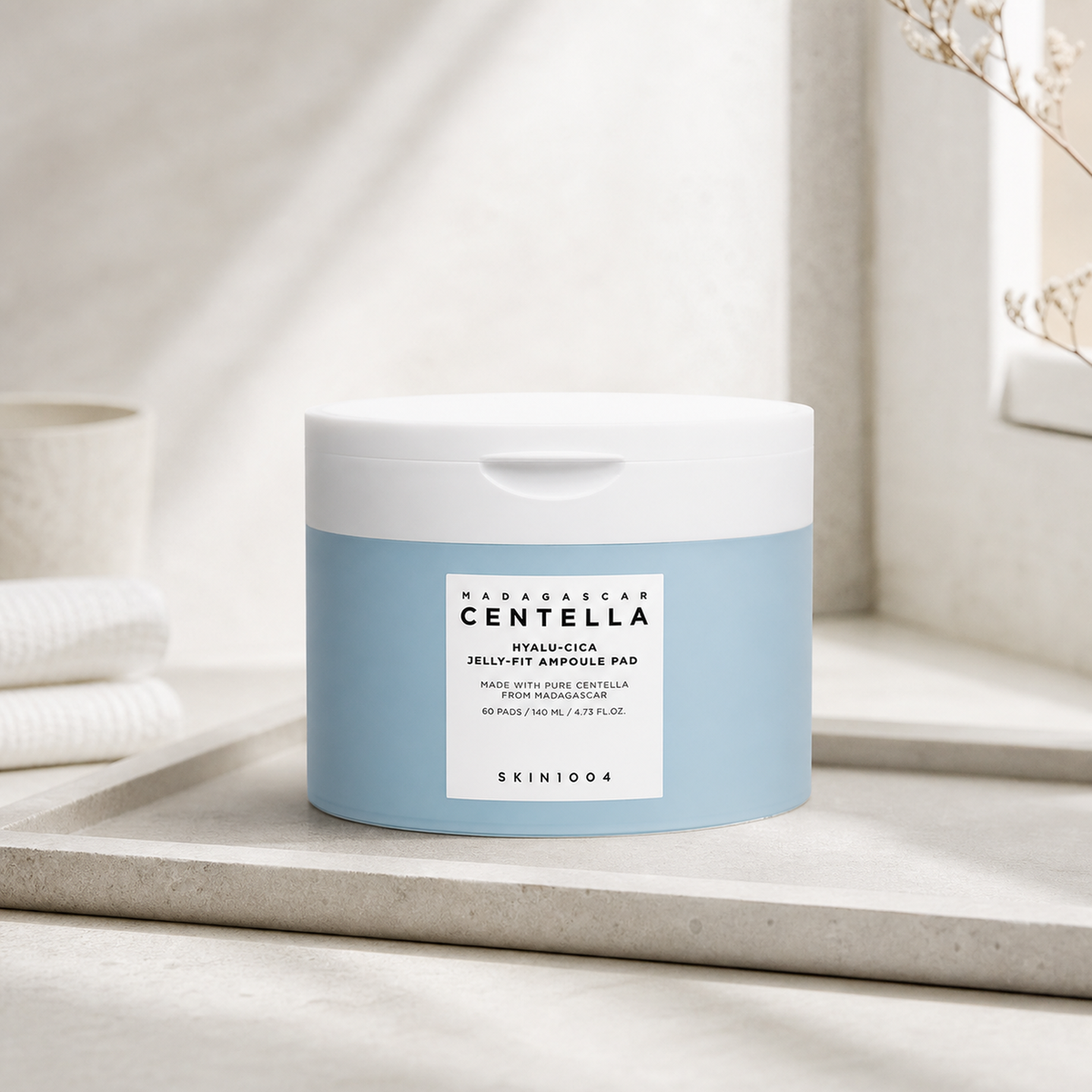 [SKIN1004] Madagascar Centella Hyalu-Cica Jelly-Fit Ampoule Pad 60pads - Routine still life PDP image