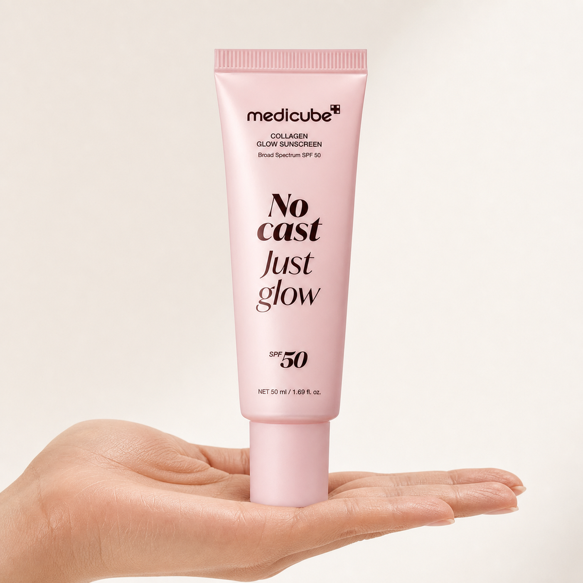 [Medicube] Collagen Glow Sunscreen 50ml - Hand scale moment PDP image