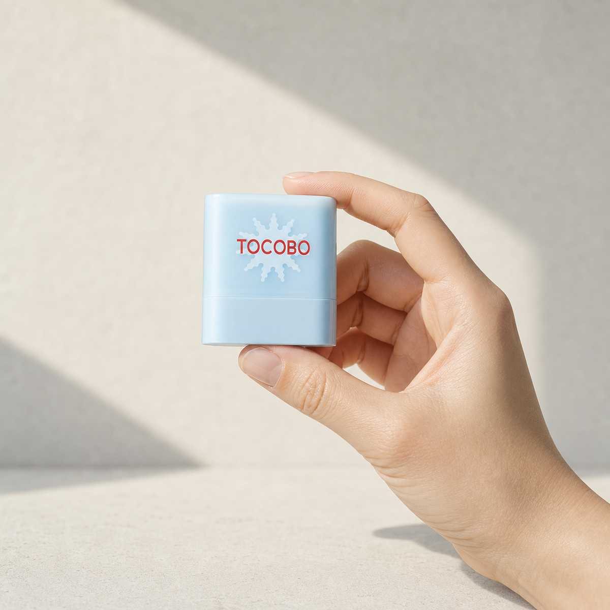 [Tocobo] Cotton Soft Sun Stick Mini 10g - Hand scale moment PDP image