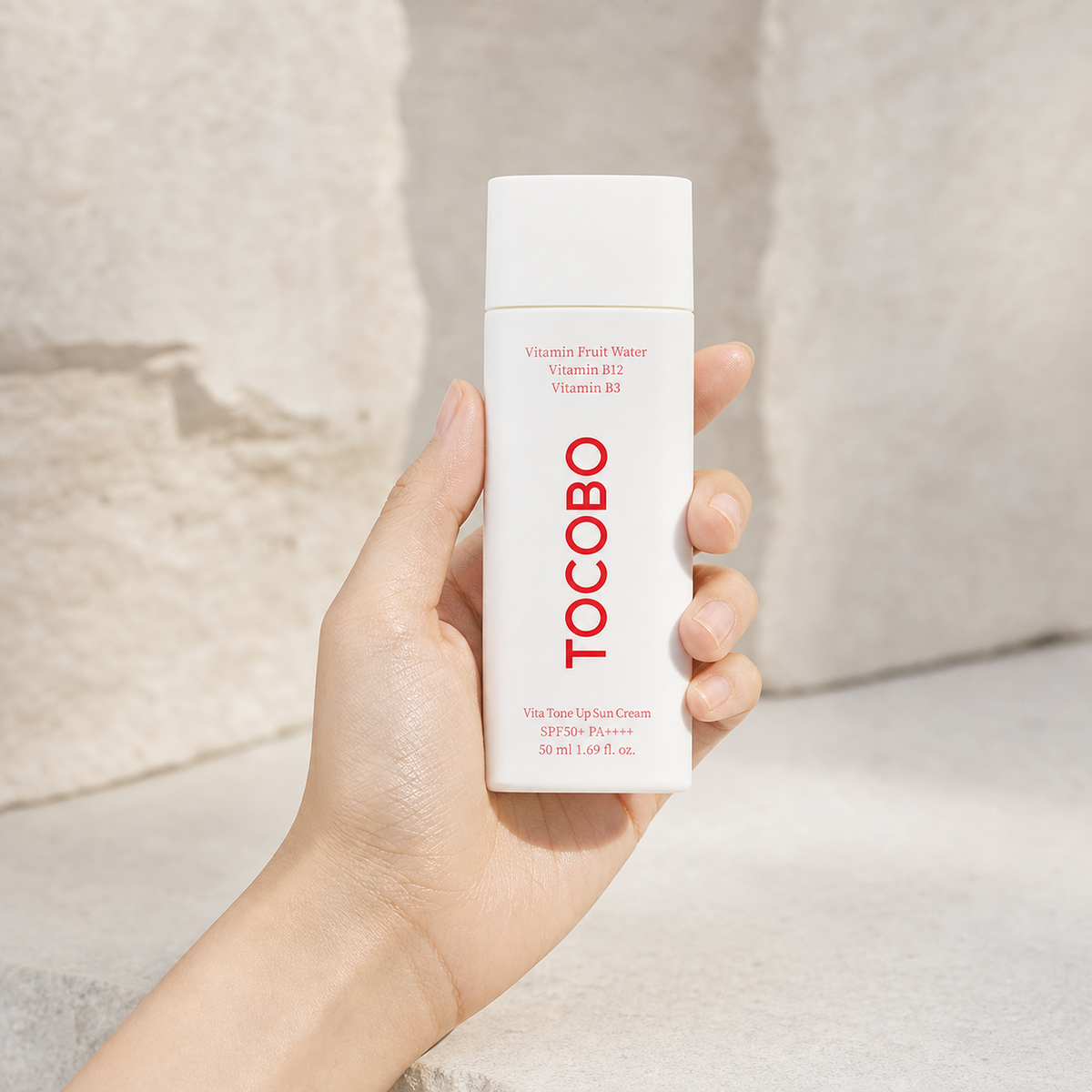 [Tocobo] Vita Tone Up Sun Cream 50ml - Hand scale moment PDP image
