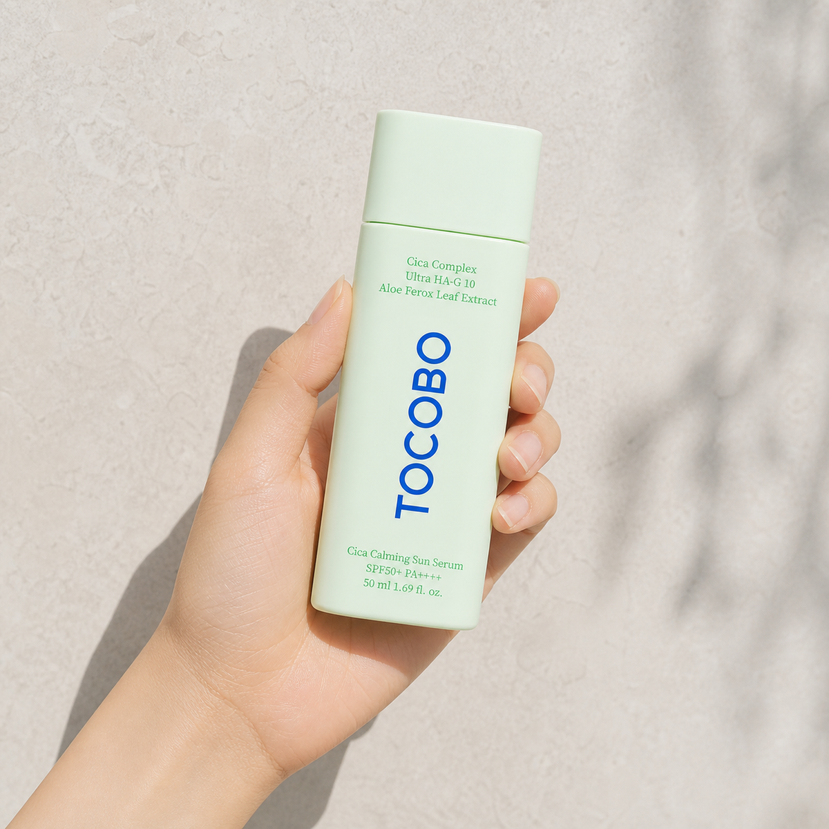 [Tocobo] Cica Calming Sun Serum 50ml - Hand scale moment PDP image