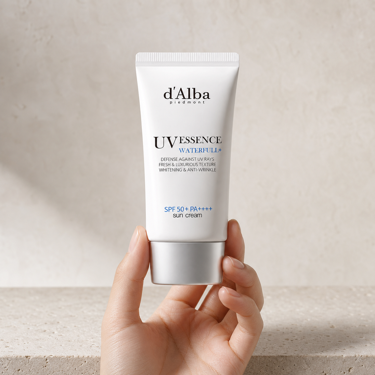 [d'Alba] Waterful Essence Sunscreen 50ml - Hand scale moment PDP image