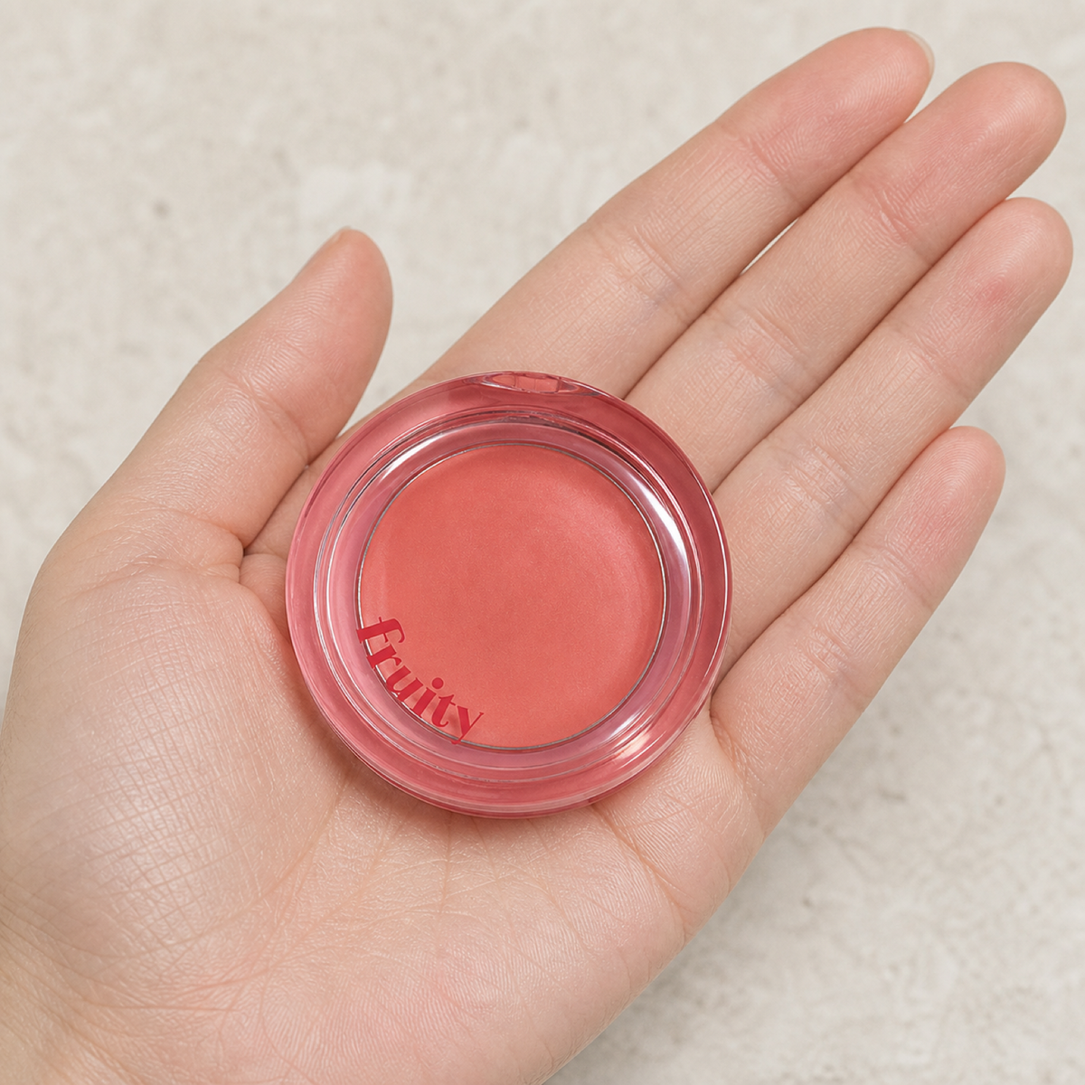 [Etudehouse]Fruity Lip & Cheek Blur Balm 2.3g - Warm Peach - Hand scale moment PDP image