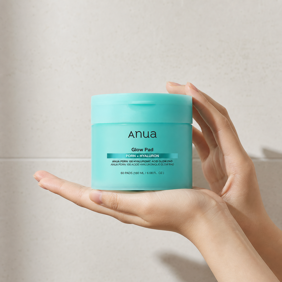 [anua] PDRN 100 Hyaluronic Acid Glow Pad 180ml 60ea - Hand scale moment PDP image