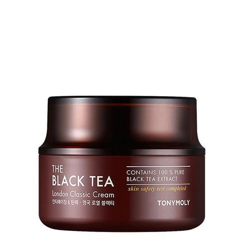 TONYMOLY The Black Tea London Classic Cream 50ml — dark glass jar with gold lid on white surface
