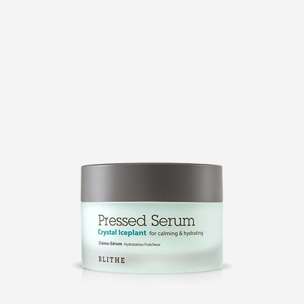 Blithe Pressed Serum Crystal Iceplant 50ml — frosted jar with spatula beside it on white surface