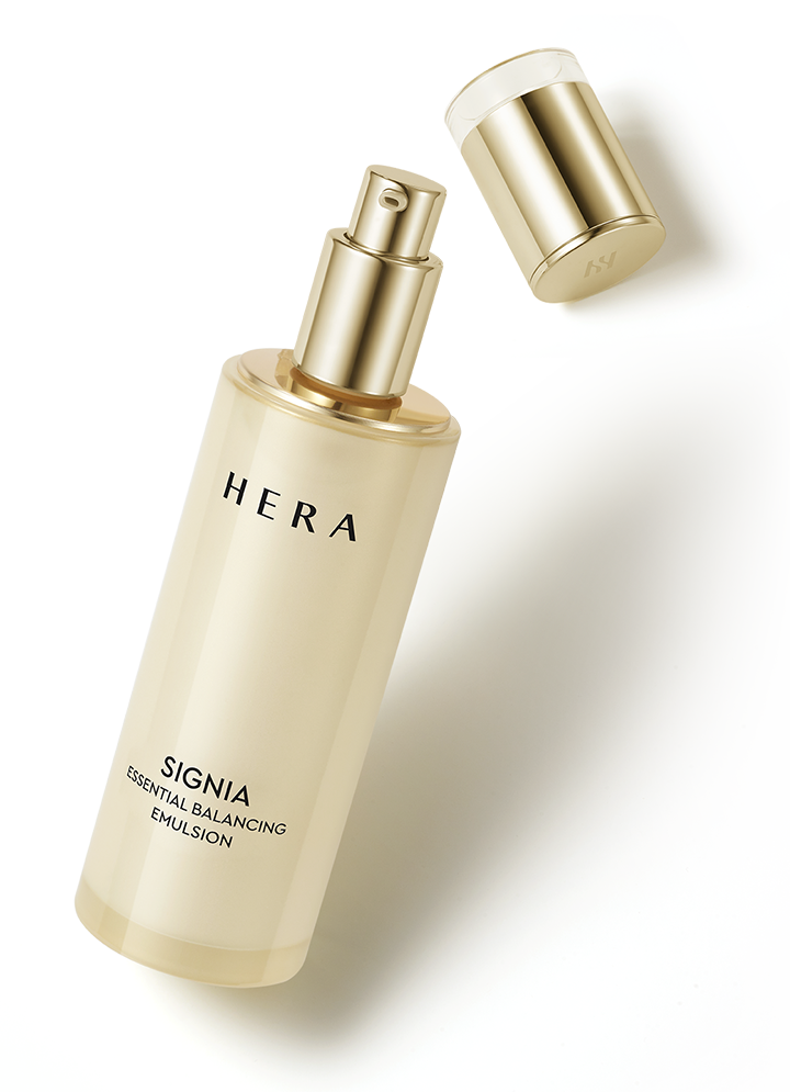 Hera Signia Essential Balancing Emulsion 150ml — elegant white pump bottle on marble-effect surface