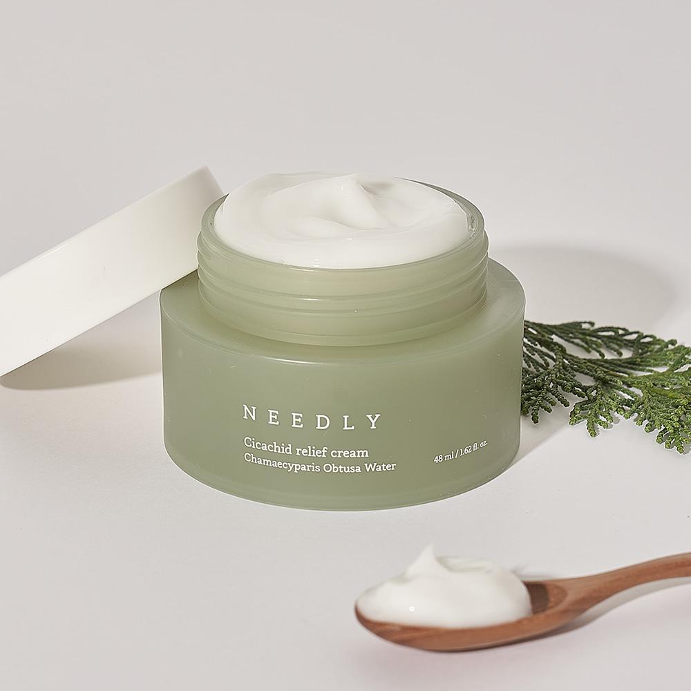 Needly Cicachid Relief Cream 48ml — pastel-green airless pump bottle on light neutral background