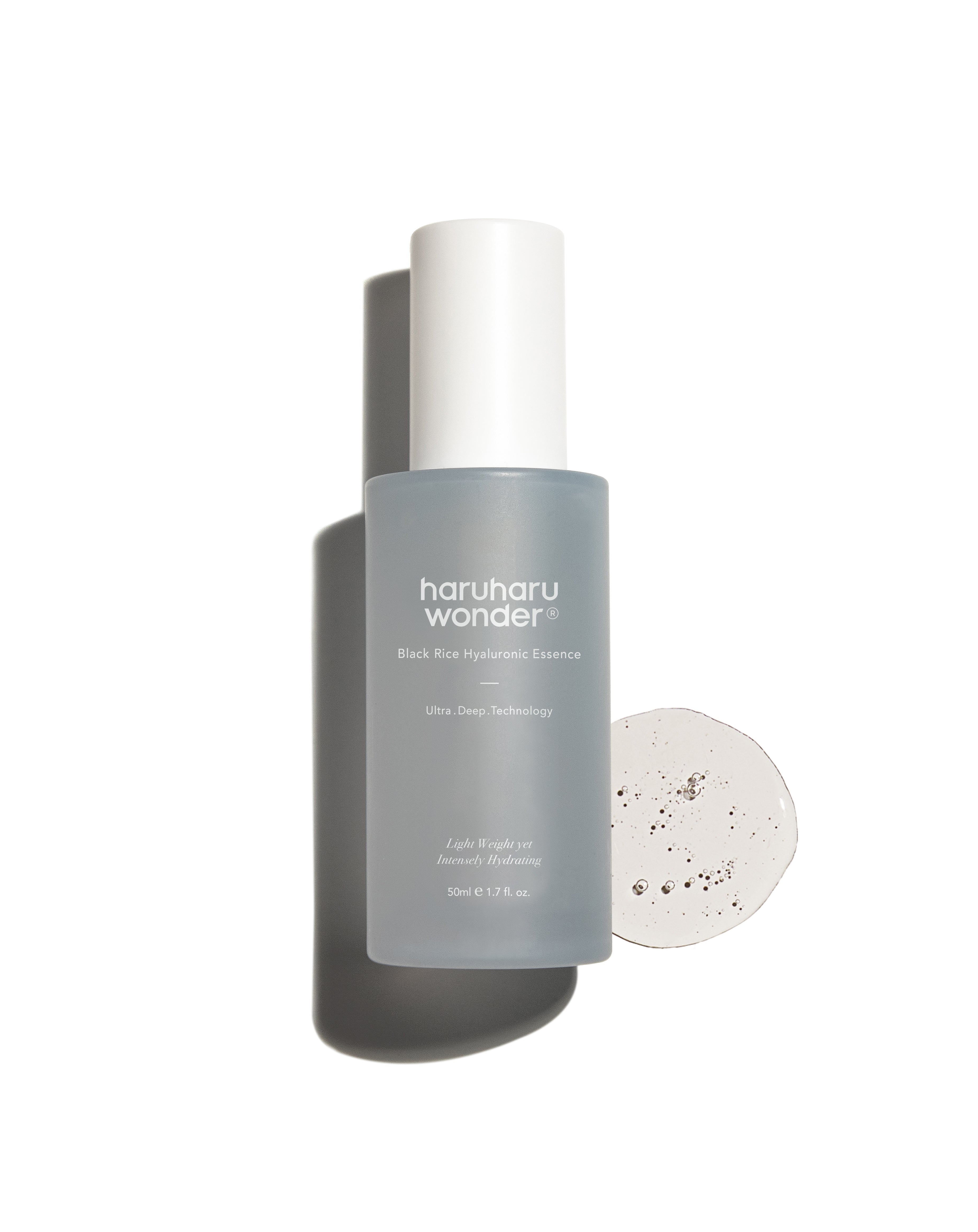 Haruharuwonder Black Rice Hyaluronic Essence 50ml — dark amber glass dropper bottle on light background
