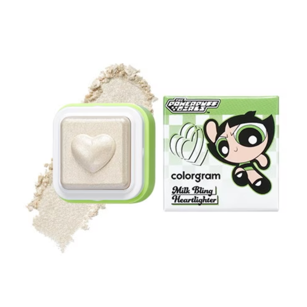 Colorgram Milk Bling Heartlighter 07 Buttercup Ivory — heart compact with ivory shimmer pan on white surface
