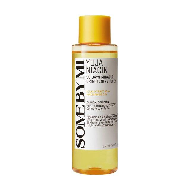 SomeByMi Yuja Niacin Brightening Toner 150ml — yellow pump bottle on white background